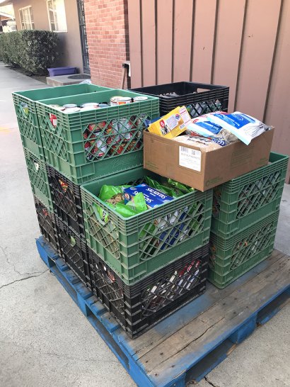 Kings Lions collected collected food Saturday (Dec. 5) for their Community Food Drive at Best Buy Market.